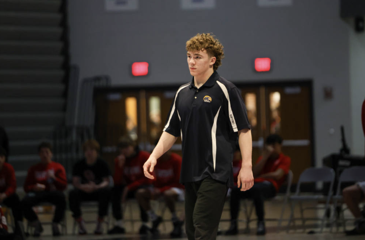 Senior Silas Stits walks out for his final match at Wrestling State Team Duals at Brownsburg.